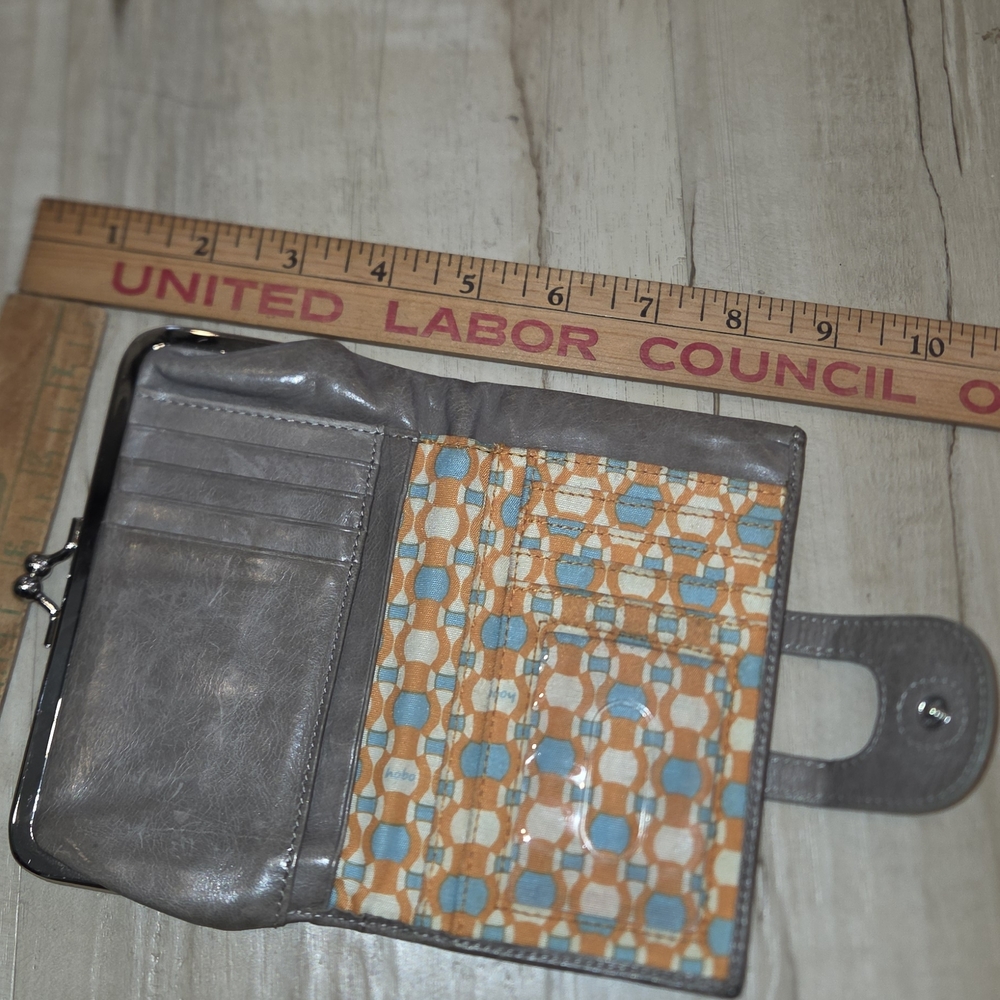 HOBO ORIGINAL Gray Leather Bifold Wallet with Blue & Orange Pattern